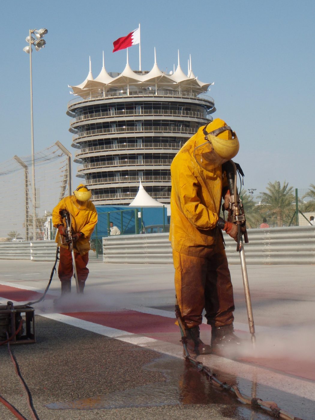 Premator Gulf operators UHP water jetting the track at Bahrain International Circuit