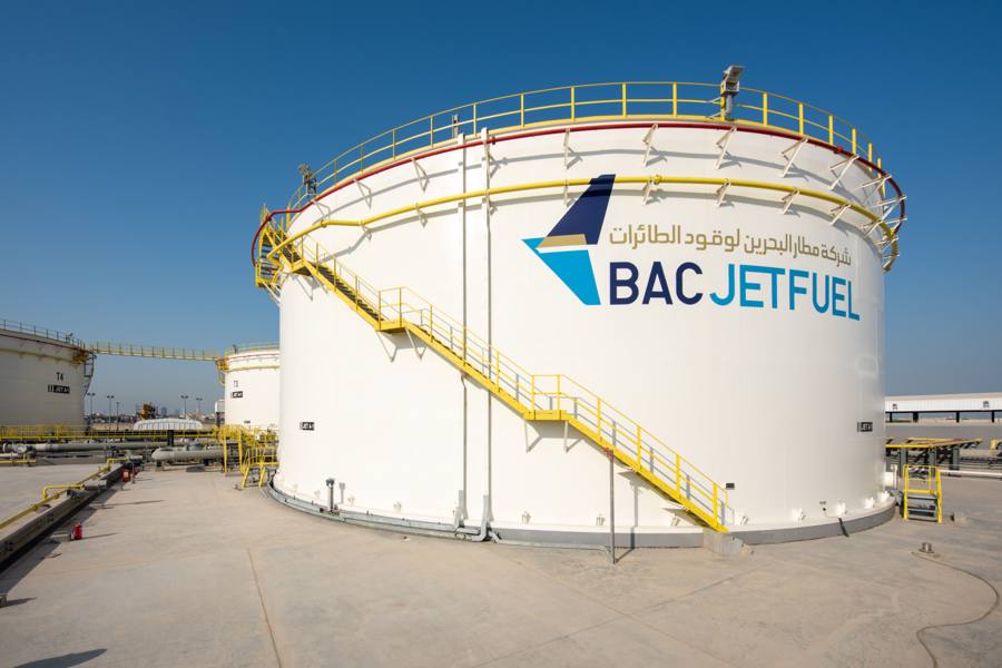 Premator crew coating a large aviation fuel storage tank