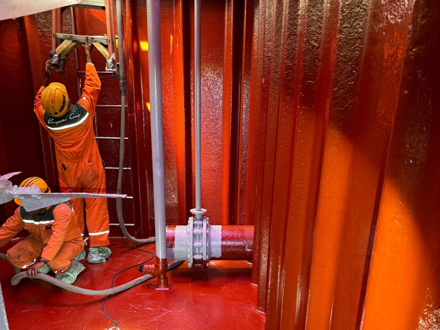 Premator Gulf crew completing a freshly coated tank interior